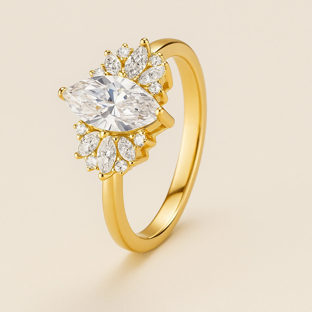 Gold plated ring with a large central diamond and smaller diamonds on a beige background