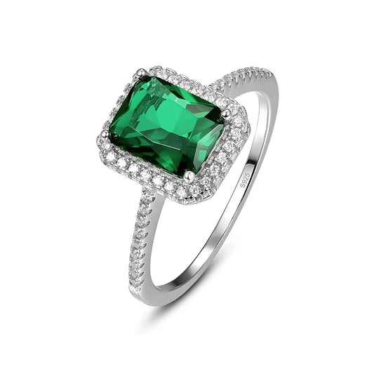 925 silver ring with deep green emerald-style stone in a bold unisex design