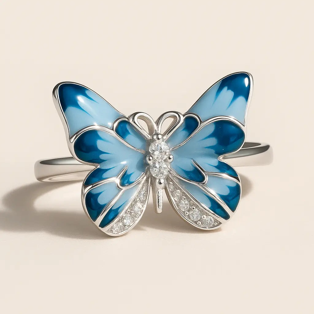 Elegant 925 silver ring featuring a blue butterfly with enamel wings and sparkling stone accents