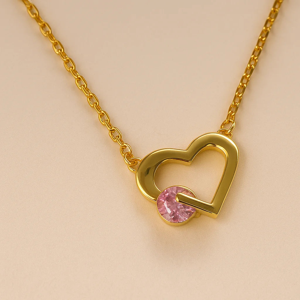 A beautiful sterling silver necklace with a heart-shaped pendant holding a single sparkling cubic zirconia stone.