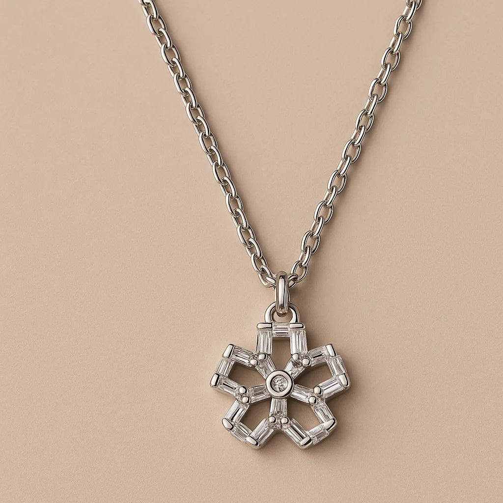 A stunning sterling silver necklace featuring a unique flower-shaped pendant with baguette-cut cubic zirconia stones.