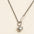 A 925 sterling silver and a gold-plated necklace, each with a smooth, polished heart-shaped pendant on a modern mixed-link chain.