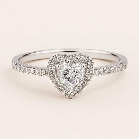 A 925 sterling silver ring with a central heart-shaped cubic zirconia stone (clear or red) and a sparkling pavé halo and band.