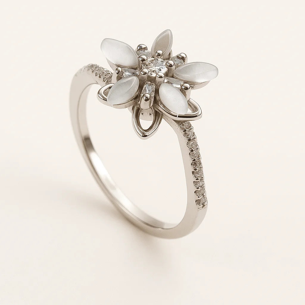 A 925 sterling silver and a gold-plated ring, each with a central lotus flower made of mother-of-pearl and sparkling cubic zirconia.