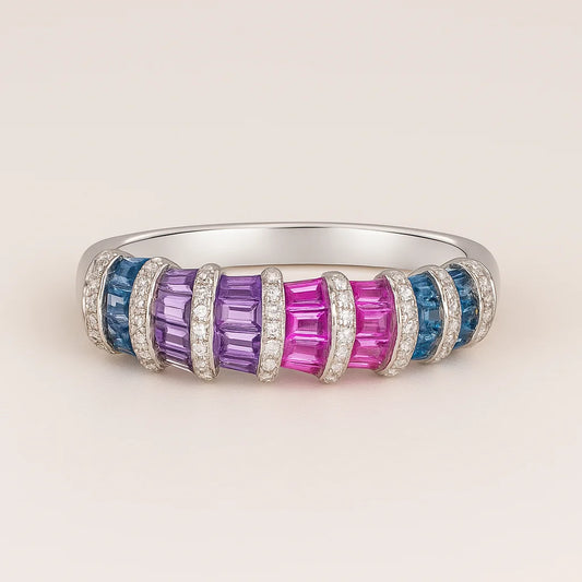 A 925 sterling silver ring with a central band of multicolored baguette-cut cubic zirconia stones flanked by pavé halos.