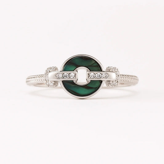 A striking 925 sterling silver ring with a central malachite stone and sparkling accents.