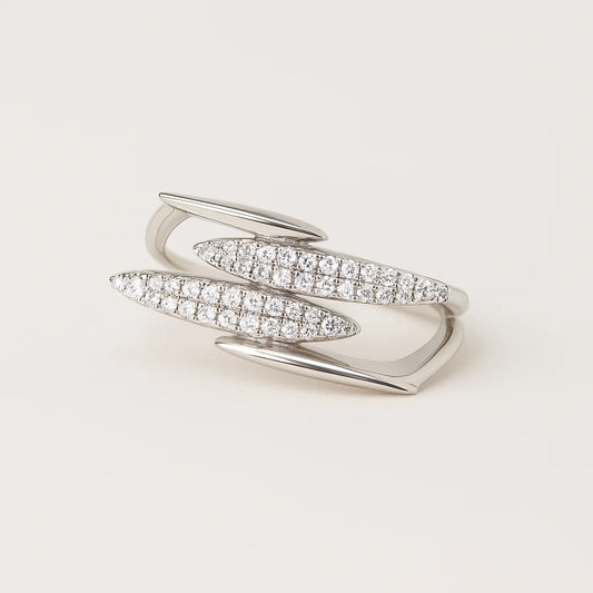 A 925 sterling silver open-band ring with a wrap-around design and two pavé cubic zirconia accents.