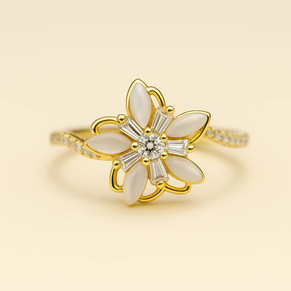 A 925 sterling silver and a gold-plated ring, each with a central flower made of mother-of-pearl, baguette, and pavé cubic zirconia.