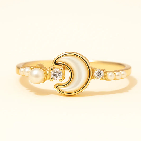 A stunning crescent moon gold-plated ring with mother-of-pearl and pearls.