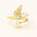 A 925 sterling silver and a gold-plated open-wrap ring with a butterfly centerpiece of mother-of-pearl and baguette cubic zirconia, and a pearl.
